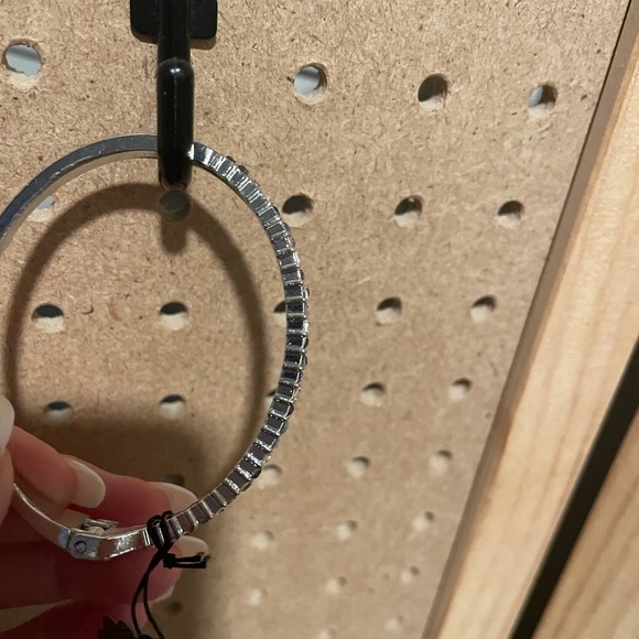 Slim silver hinge bangle with multiple baguettes in blues and silvers. - Picture 2 of 4